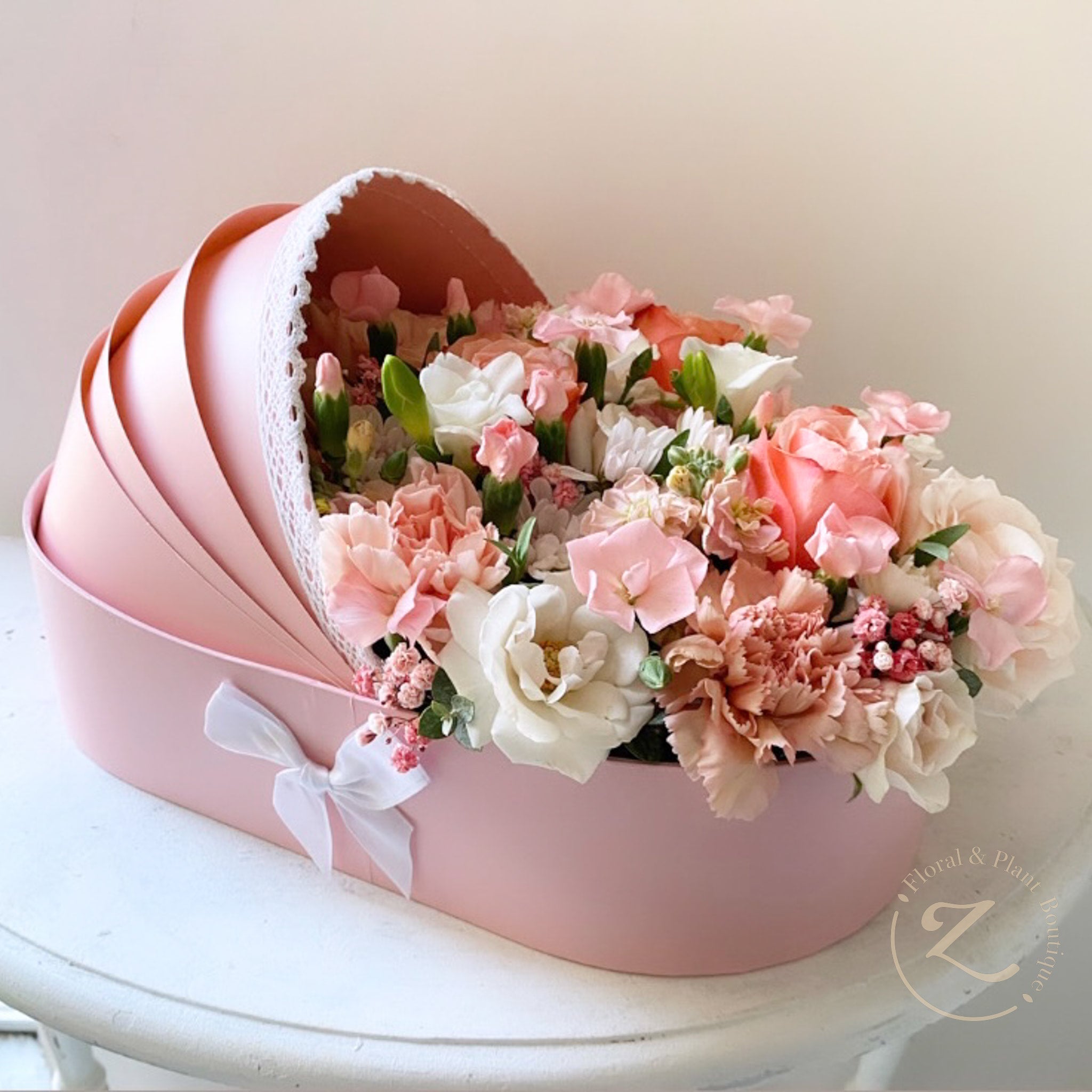baby bassinet floral arrangement Zuhoor Floral Plant